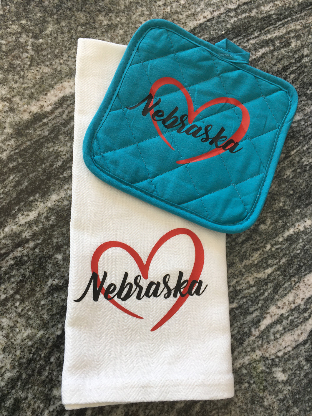 Love Nebraska Towel with teal hot pad