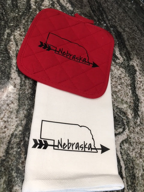 Nebraska with arrows on bottom of State Towel with red hot pad